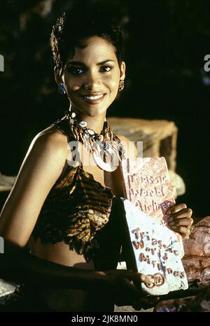 Halle Berry film: The Flintstones (USA 1994) personnages: Miss Stone Director: Brian Levant 23 mai 1994 **AVERTISSEMENT** cette photographie est destinée à un usage éditorial exclusif et est le droit d'auteur de HANNA-BARBERAUNIVERSAL et/ou du photographe assigné par la Société du film ou de la production et ne peut être reproduite que par des publications dans le cadre de la promotion du film ci-dessus. Un crédit obligatoire à HANNA-BARBERAUNIVERSAL est requis. Le photographe doit également être crédité lorsqu'il est connu. Aucune utilisation commerciale ne peut être accordée sans l'autorisation écrite de la Société du film. Banque D'Images