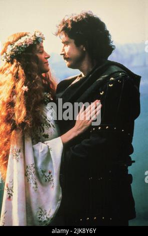 UMA Thurman & Patrick Bergin film: Robin Hood (USA/CAN/UK/DE 1991) personnages: Maid Marian & Sir Robert Hode / <a href= Directeur: John Irvin 13 mai 1991 **AVERTISSEMENT** cette photographie est à usage éditorial exclusif et est le droit d'auteur de 20th CENTURY FOX et/ou le photographe assigné par la Société de film ou de production et ne peut être reproduite que par des publications dans le cadre de la promotion du film ci-dessus. Un crédit obligatoire à 20th CENTURY FOX est requis. Le photographe doit également être crédité lorsqu'il est connu. Aucune utilisation commerciale ne peut être accordée sans l'autorisation écrite de la Société du film. Banque D'Images