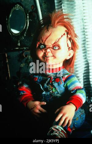 Chucky film: Mariée de Chucky (USA/CAN 1998) Directeur: Ronny Yu 15 octobre 1998 **AVERTISSEMENT** cette photographie est destinée à un usage éditorial exclusif et est protégée par les droits d'auteur des IMAGES UNIVERSELLES et/ou du photographe attribué par la Société de film ou de production et ne peut être reproduite que par des publications dans le cadre de la promotion du film ci-dessus. Un crédit obligatoire pour LES PHOTOS UNIVERSELLES est requis. Le photographe doit également être crédité lorsqu'il est connu. Aucune utilisation commerciale ne peut être accordée sans l'autorisation écrite de la Société du film. Banque D'Images