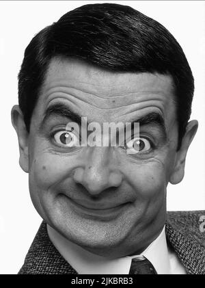 Rowan Atkinson film Mr Bean (1993) personnages : MR. BEAN 01 mai 1993 **AVERTISSEMENT** cette photographie est réservée à un usage éditorial et est la propriété de TIGER ASPECT et/ou du photographe désigné par le film ou la société de production et ne peut être reproduite que par des publications dans le cadre de la promotion du film ci-dessus. Un crédit obligatoire pour TIGER ASPECT est requis. Le photographe doit également être crédité lorsqu'il est connu. Aucune utilisation commerciale ne peut être accordée sans autorisation écrite de The film Company. Banque D'Images