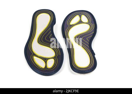 Semelles intérieures en mousse et en silicone.Semelles intérieures orthopédiques pour chaussures de sport isolées sur fond blanc.Photo haute résolution.Profondeur de champ complète. Banque D'Images