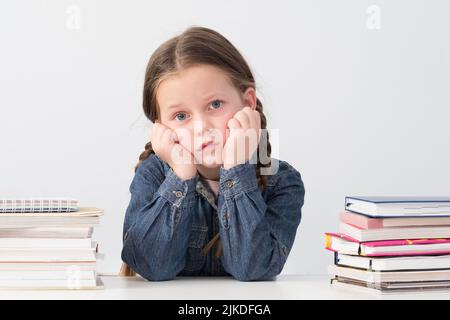 éducation primaire lasse école fille livre piles Banque D'Images