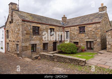 Dent, Cumbria, Royaume-Uni, 12 août 2018 - façade d'un bâtiment en pierre dans le village de Dent dans le Yorkshire Dales, Royaume-Uni Banque D'Images