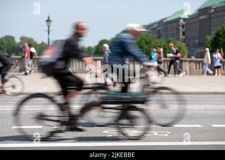 longue exposition des cyclistes sur une piste cyclable Banque D'Images