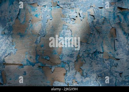 Un gros plan d'une vieille texture de mur en bois bleu abîmé Banque D'Images