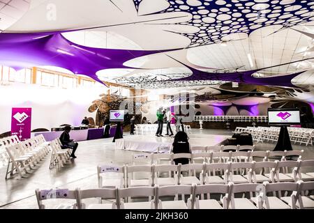 The interior decor and white empty chairs at a conference event Stock Photo