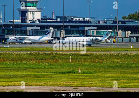 The passenger planes landed at the Riga airport terminals Stock Photo