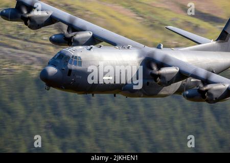 A low-flying aircraft MC130J Hercules Mildenhall on training in Mach Loop, North Wales Stock Photo