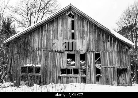 A greyscale shot of an old barn located along US 31 between Ludington and Manistee in Michigan Stock Photo