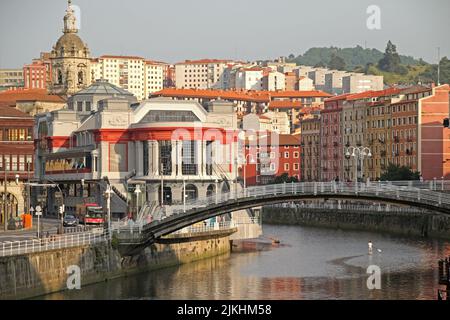 A scenic view of the old town and the bridge over the river in Bilbao, Spain. Stock Photo