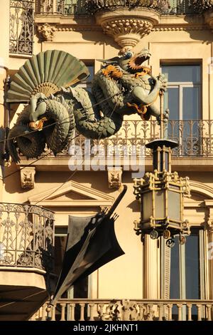 A vertical shot of the Chinese dragon on 19th century House of Umbrellas (Casa Bruno Cuadros) building on La Rambla in Barcelona, Catalonia, Spain Stock Photo