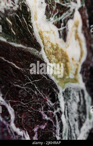 A macro focus shot of a colorful marble stone Stock Photo