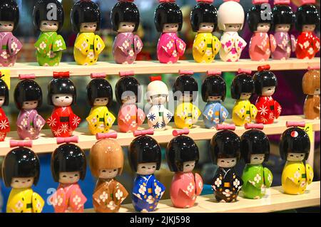 A collection of Japanese dolls inspired by the tradition of mini kokeshi dolls for sale Stock Photo