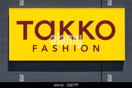 Publicité et signe de la société Takko Banque D'Images
