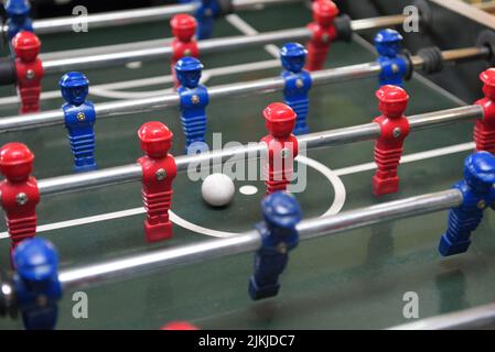 A closeup of the table football, also called table soccer. Stock Photo