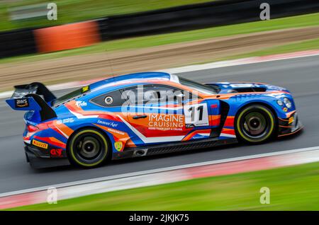 A long exposure shot of a Bentley Continental GT3  car during the race in the British GT Championship, Stock Photo