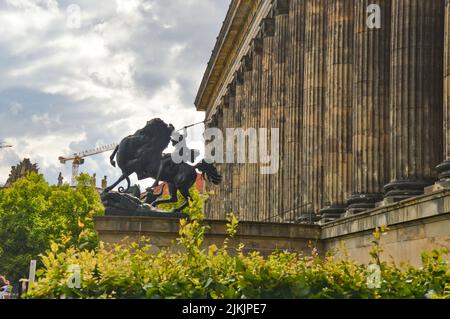 A beautiful shot of the Lowenkampfer (The Lion fighter) bronze equestrian statue outside Altes Museum in Berlin, Germany. Stock Photo