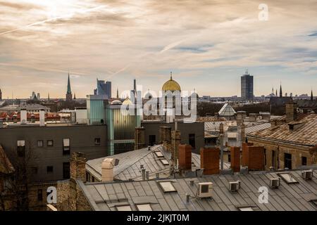 An aerial shot of the rooftops of the buildings of Kyiv on a sunny day against dusk sky, Ukraine Stock Photo