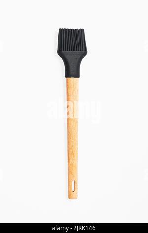 A vertical shot of a pastry brush isolated on a white background Stock Photo