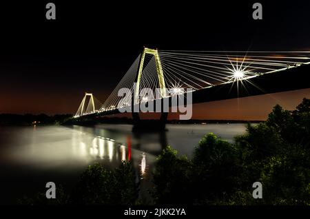 A beautiful shot of Lewis and Clark Bridge at night in Louisville, Kentucky, United States Stock Photo