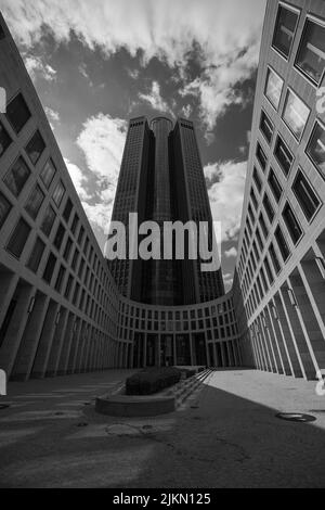 A vertical low angle grayscale shot of the Tower 185 in Hessen, Frankfurt, Germany Stock Photo