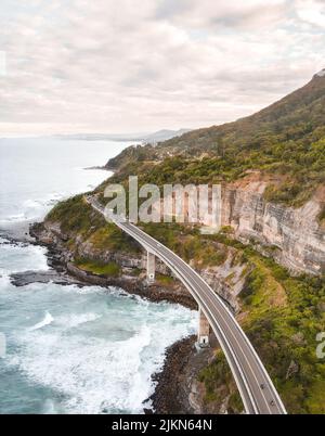 An aerial vertical shot of the Sea Cliff Bridge in New South Wales, Australia Stock Photo