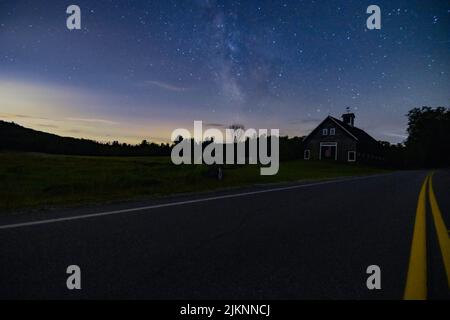 The beautiful view of Milky way over a barn Stock Photo