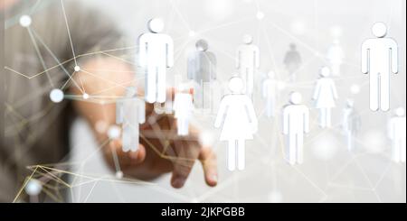 A network graphic with white icons with a person's hand touching it from the background Stock Photo