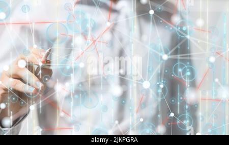 A network graphic with a person's hand holding a pen touching it from the background Stock Photo