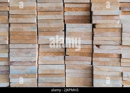 Têtes empilées forme rectangulaire en bois sur le magasin d'entrepôt, texture en bois et arrière-plan Banque D'Images