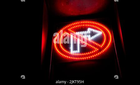 A glowing 'No Right Turn' LED street sign Stock Photo