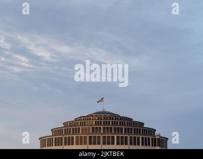 A beautiful shot of the Centennial Hall (Hala Stulecia) against cloudy sky during daytime in Wroclaw, Poland Stock Photo