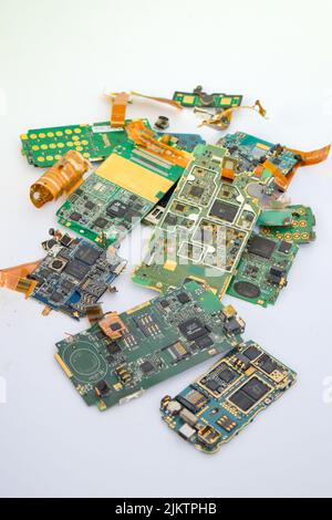 Mobile phone electronic waste containing gold metal Stock Photo