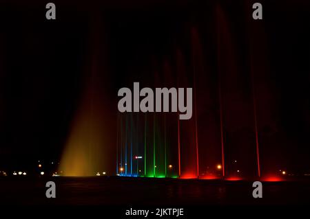 A colorful fountain and lights show at night in Lima, Peru Stock Photo