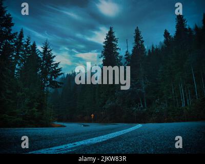 A scenic view at the Mount Baker Highway in Washington, USA under a dark stormy clouds Stock Photo