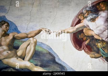 The Creation of Adam on Sistine Chapel's ceiling in Rome Stock Photo