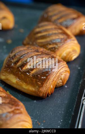 A vertical closeup of freshly baked Pain au chocolate Stock Photo