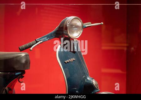 A closeup shot of Piaggio Vespa on display in the museum of cinema in Turin, Italy Stock Photo