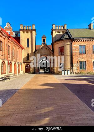 A vertical shot of the Cathedral School gate in Stora Sodergatan street in central Lund, Sweden Stock Photo