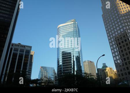 A low angle view of the downtown Vancouver with buildings with glass windows in the daytime, Canada Stock Photo