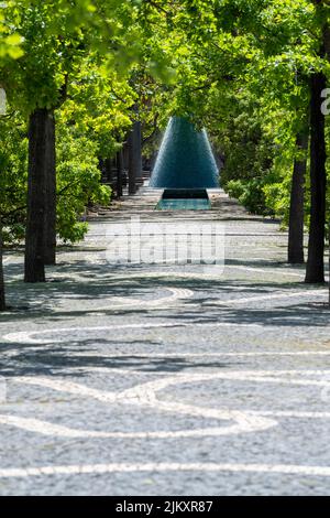 Water sources known as volcanoes at the end of a pathway in Alameda dos Oceanos, Parque das Nacoes, Lisbon Stock Photo