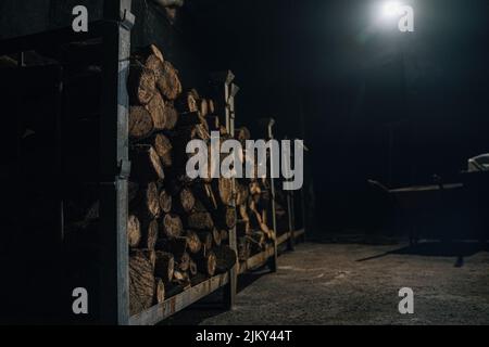 A beautiful shot of laid logs on a shelves Stock Photo