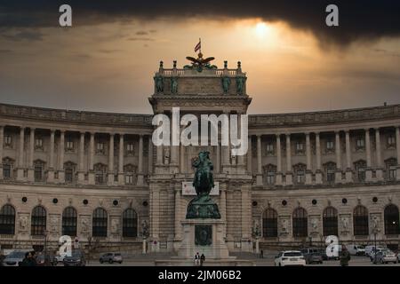 An outstanding the Neue Burg wing of the Hofburg Palace with an equestrian statue to Archduke Charles Stock Photo