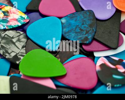 close up of a selection of colorful guitar picks Stock Photo