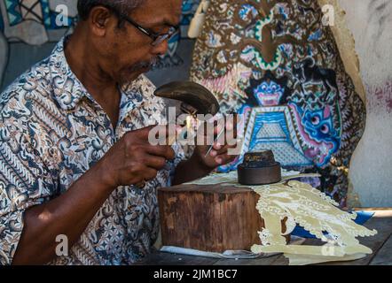 Ouvrier traditionnel de Batik à Yogyakarta, Indonésie Banque D'Images