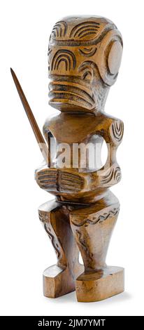 Un Tiki en bois, un dieu païen de Polynésie française, isolé sur le backgroung blanc Banque D'Images