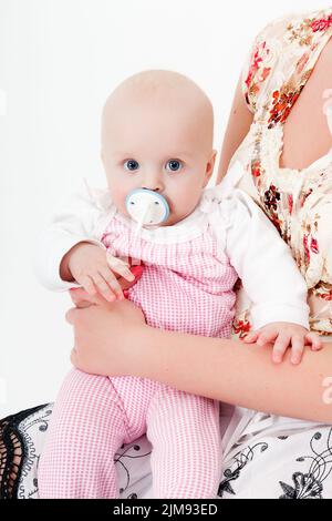 Bébé fille avec une sucette Banque D'Images