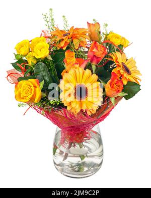 Bouquet de gerbera, roses et autres fleurs dans un vase en verre. Banque D'Images
