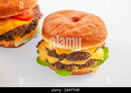 Deux hamburgers de beignets de Brioche font l'affaire du repas Banque D'Images