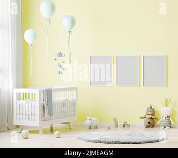 Cadre d'affiche vierge maquette sur le mur jaune dans le fond intérieur de la chambre de bébé avec literie de bébé, jouets doux, ballons, rendu 3D Banque D'Images